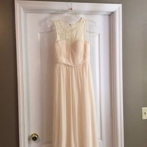 Long ivory dress. Size L. Lace and sequin top. Never been worn.